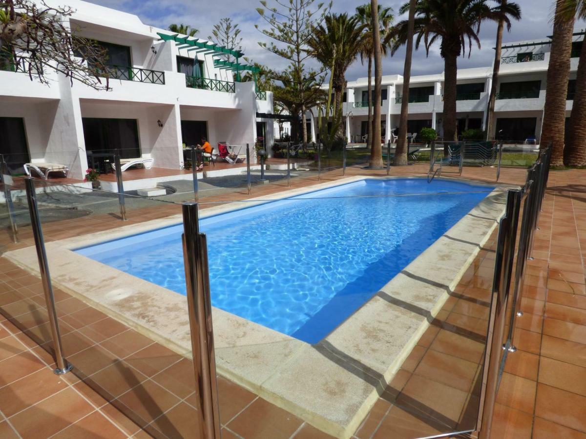 Departamento Joelle Apartment ปูแอร์โตเดลคาร์เมน ภายนอก รูปภาพ